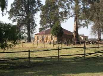 The house before the new roof was fitted.